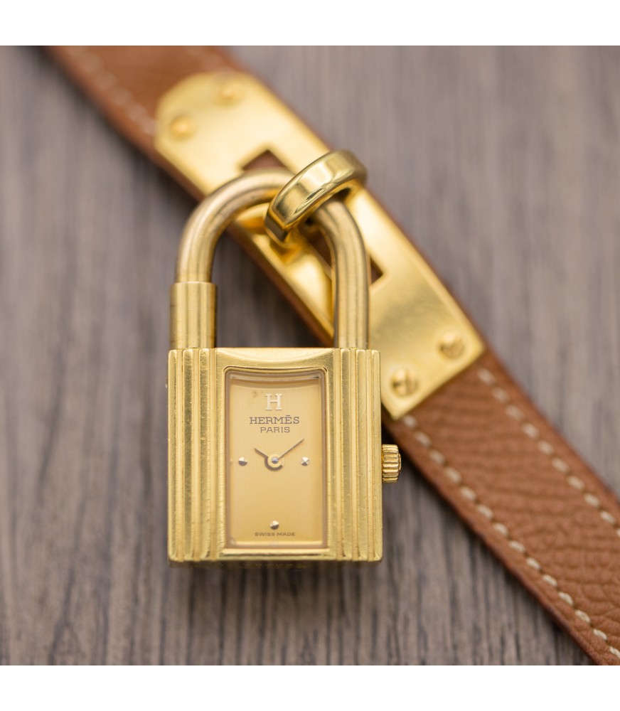 wrist watch with an open lock on a leather strap of a women's watch back  view Stock Photo - Alamy